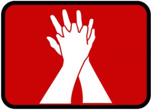 Twee witte handen op elkaar op een rode achtergrond tonen de juiste positie voor reanimatie, met benadrukking door lichteffect.