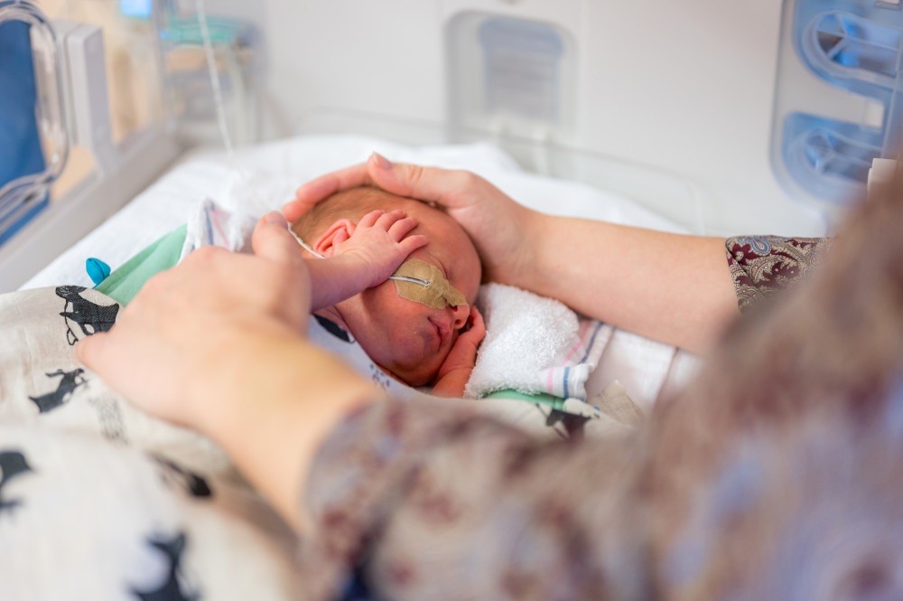 Baby met sondevoeding